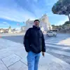 Man with a street in his background featuring on swissnewswire